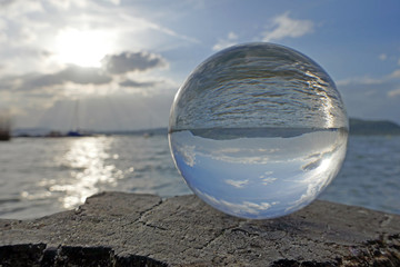 Sonnenuntergang am Murtensee in Kristallkugel, Schweiz 