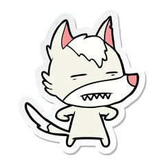 sticker of a cartoon wolf showing teeth