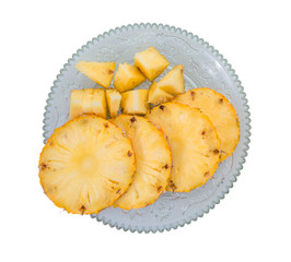 Pineapple slices on white background. Fresh raw ripe fruit.