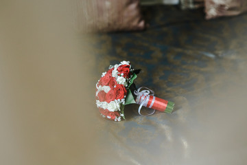 Bouquet of flowers live on a dark background.