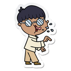 sticker of a cartoon boy wearing spectacles and making point