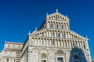 Obraz premium The leaning tower of pisa at Piazza del Miracoli Duomo square,Camposanto cemetery in Tuscany, Italy