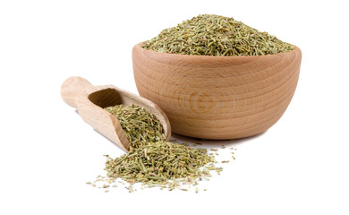 rosemary leaves in wooden bowl and scoop isolated on white background. Spices and food ingredients.