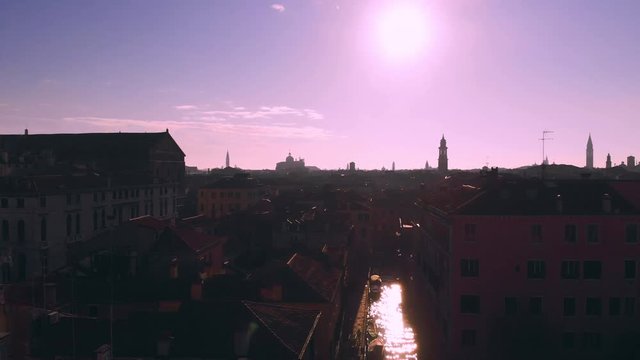 The city of Venice Italy with a beautiful Sun over the City. Filmed with a DJI Mavic Air in 4k.