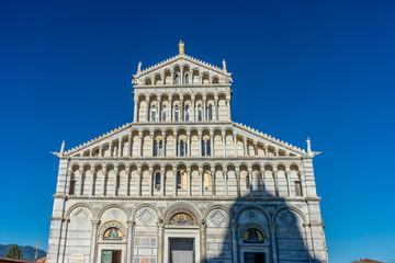 Fototapeta premium The leaning tower of pisa at Piazza del Miracoli Duomo square,Camposanto cemetery in Tuscany, Italy