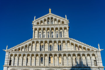 Fototapeta premium The leaning tower of pisa at Piazza del Miracoli Duomo square,Camposanto cemetery in Tuscany, Italy