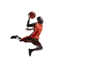 Poster Full length portrait of a basketball player with a ball isolated on white studio background. advertising concept. Fit african anerican athlete jumping with ball. Motion, activity, movement concepts. © master1305