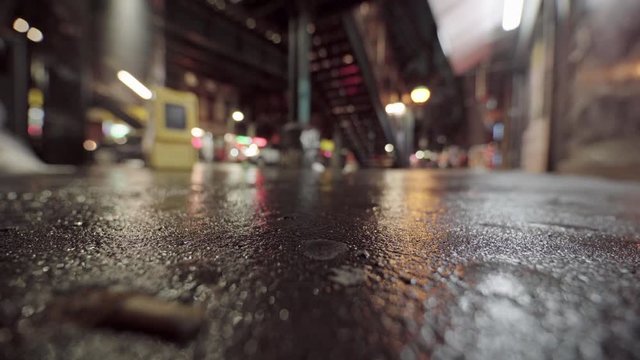 Out Of Focus Dystopian Street With Focus on Asphalt, Night
