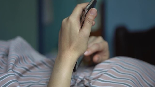 Woman hand using smart phone for social midia and ecommerce concept.