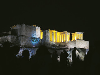 Silhouettes of people on the background of the Parthenon.Extra black and white.High contrast.Athens,Greece.