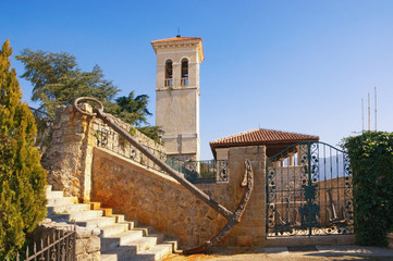 View of Old Town of Herceg Novi on sunny winter day. Bell tower of Saint Jerome Church.  Montenegro