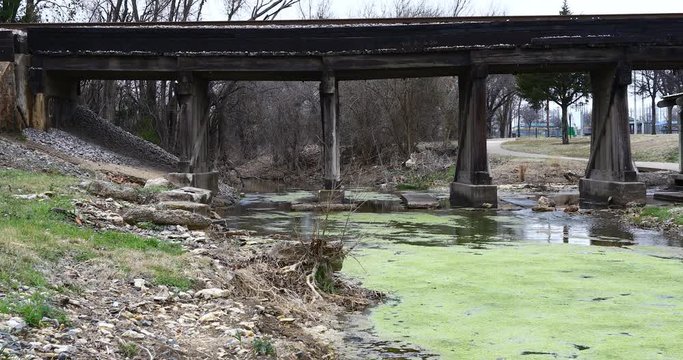 This is a video of Bear creek in Keller Texas.  The creek is flowing under a bridge.  The bridge is the railroad tracks that run north and south through Keller.