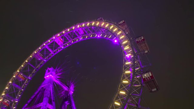 Illuminated Ferris Wheel at night in Prater in Vienna by night