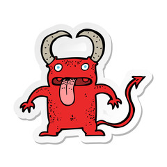 sticker of a cartoon little devil