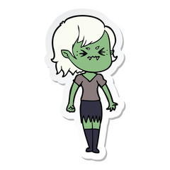 sticker of a annoyed cartoon vampire girl