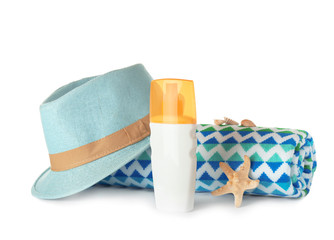 Composition with beach accessories on white background