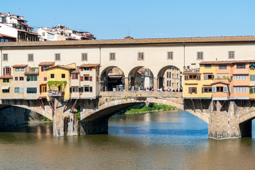 Fototapeta na wymiar Closeup view of Ponte Vecchio old bridge over river Arno - Florence, Tuscany, Italy. Built in Roman times, it was the only bridge across the Arno in Florence until 1218