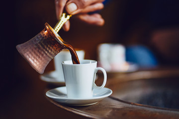 turkish coffee being made in a traditional way