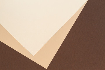 Color papers geometry composition background with beige and brown color tones