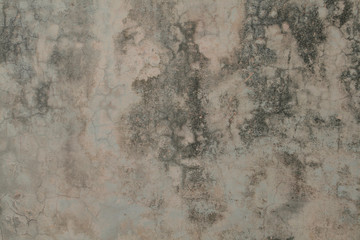 Close up of a concrete wall with moisture and breaks