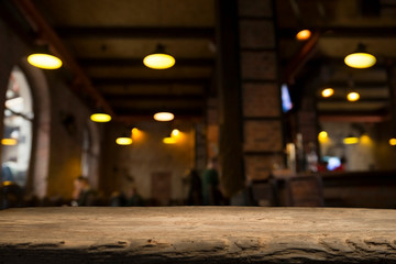 Beer barrel with beer glasses on a wooden table. The dark brown background.