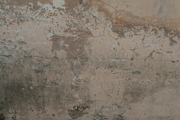  Close up of a concrete wall with moisture and breaks
