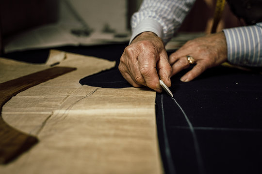 Craftsman tailor at work in the workshop