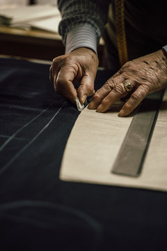 Craftsman tailor at work in the workshop