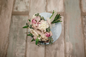 Beautiful bridal bouquet of powder roses.