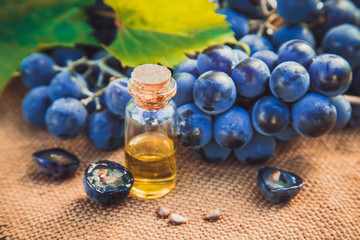 grape seed extract in a small jar. Selective focus.