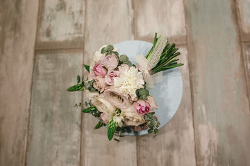 Beautiful bridal bouquet of powder roses.