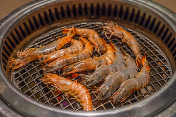 Shrimps grilled barbecue on the hot stove