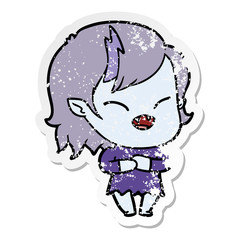 distressed sticker of a cartoon laughing vampire girl
