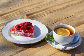 cake and lemon tea in the open air