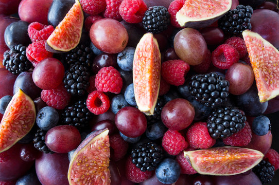  Ripe Blackberries, Blueberries, Plums, Pink Grapes, Raspberries And Figs. Mix Berries And Fruits. Top View. Background Berries And Fruits. Various Fresh Summer Fruits. Black-blue And Red Food.