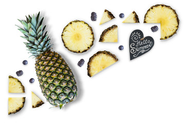 Composition with pineapple and slices on a white background. Summer tropical fruits..Cocktail of fruits. Flat lay, top view, copy space.