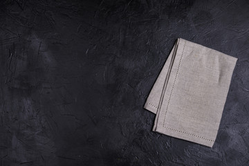 Business lunch, Table place setting with linen napkin on black color background, banner, top view,...