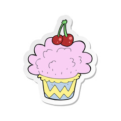 sticker of a cartoon cupcake