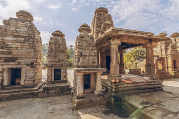 Obraz premium Ancient stone temples of Baijnath at Bageshwar district of Uttarakhand India. Baijnath temples are a popular tourist attraction near Kausani Uttarakhand.