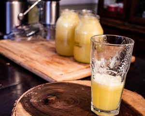 A glass of fresh squeezed pineapple juice