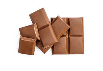 Pieces of chocolate bar on white. Top view.