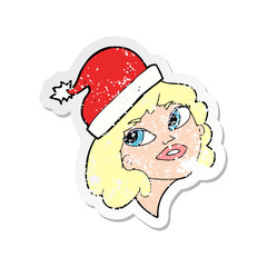 retro distressed sticker of a cartoon woman ready for christmas