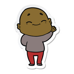 sticker of a cartoon happy bald man