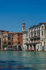Fototapeta na wymiar Italy, Venice, Grand Canal, VIEW OF BUILDINGS AGAINST BLUE SKY