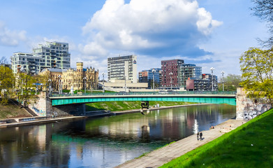 Fototapeta premium Green bridge over the Neris river. Vilnius,Lithuania