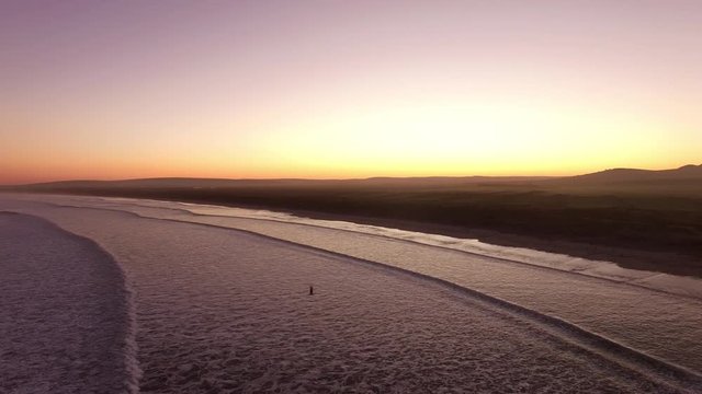 Drone shot of sunset over ocean near Paternoster in South Africa.