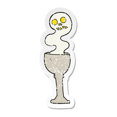 retro distressed sticker of a cartoon spooky halloween goblet