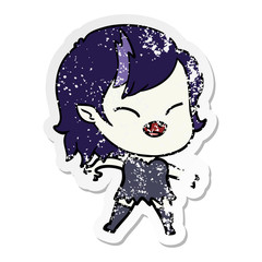 distressed sticker of a cartoon laughing vampire girl