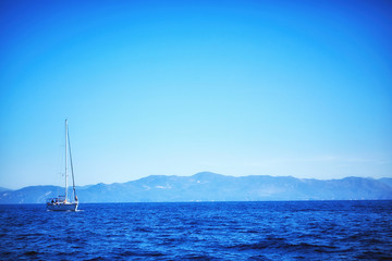 little sailing yacht in the blue sea. Greece. panoramic view