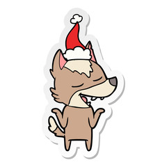 sticker cartoon of a wolf laughing wearing santa hat